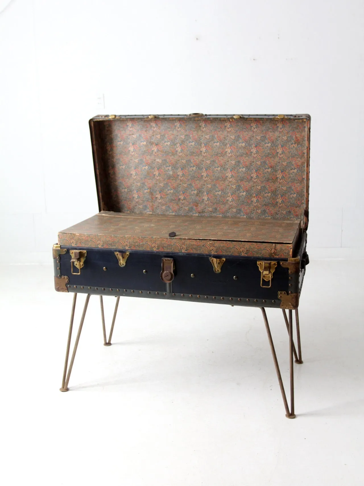 antique steamer trunk with hairpin legs